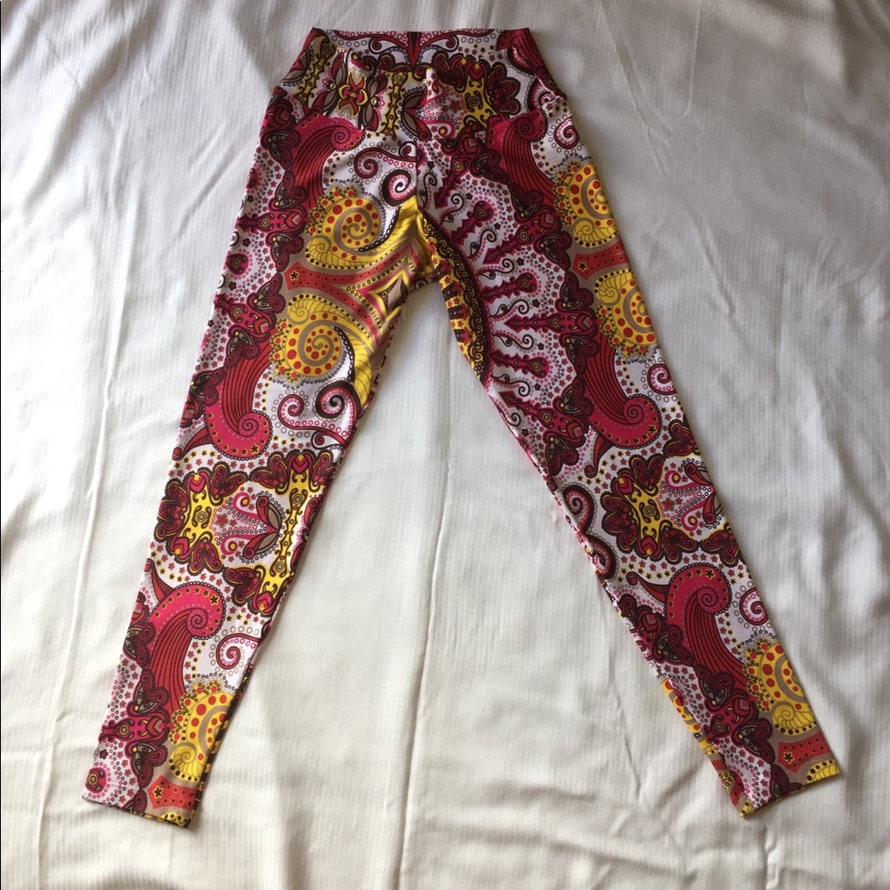 Pink and yellow paisley patterned leggings with a 3” wide waist band